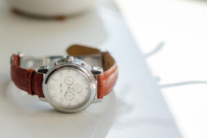 Silver and white analog watch